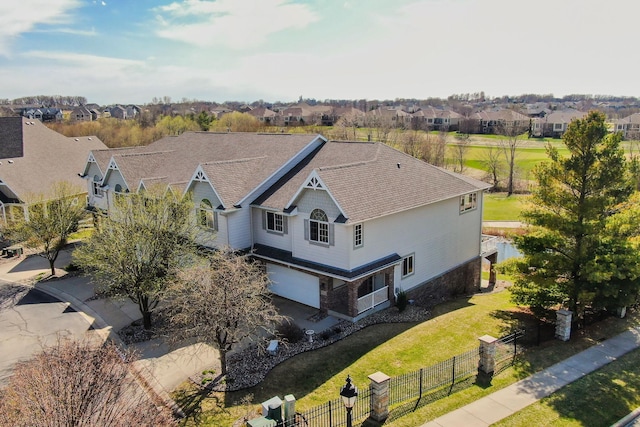 drone / aerial view with a residential view