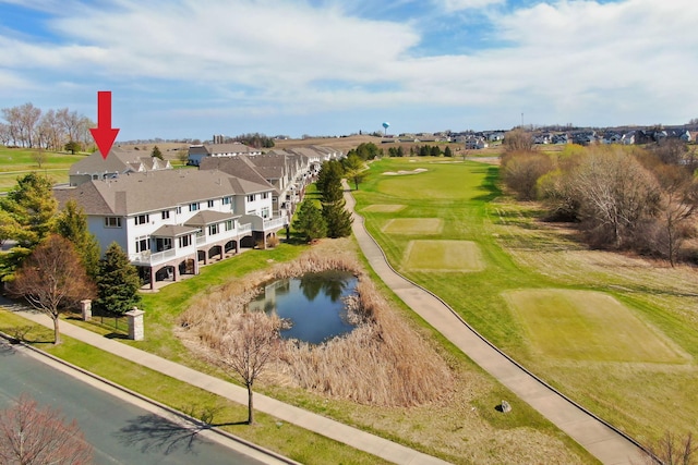 drone / aerial view featuring a water view and view of golf course