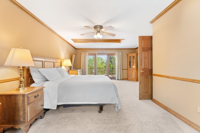 bedroom with crown molding, light carpet, and ceiling fan