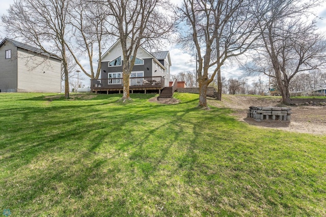 view of yard with a deck