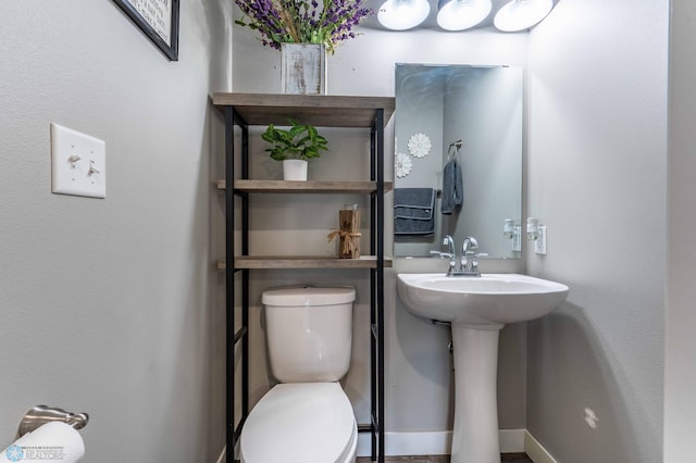 bathroom featuring toilet