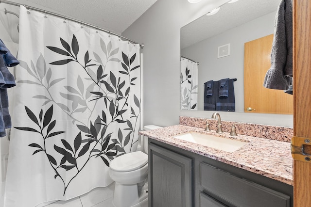 full bathroom featuring a textured ceiling, visible vents, toilet, vanity, and tile patterned flooring