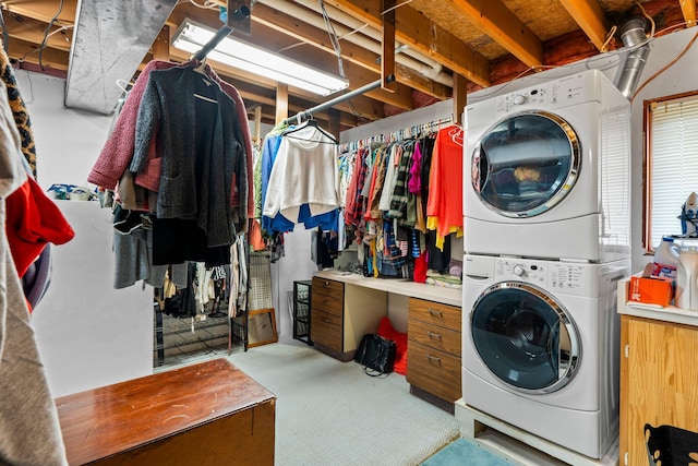 13229 Fremont Ave, Zimmerman, MN 55398 - laundry area featuring stacked washer / drying machine and carpet