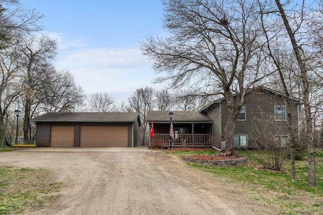 13229 Fremont Ave, Zimmerman, MN 55398 - view of front of property featuring driveway and a porch