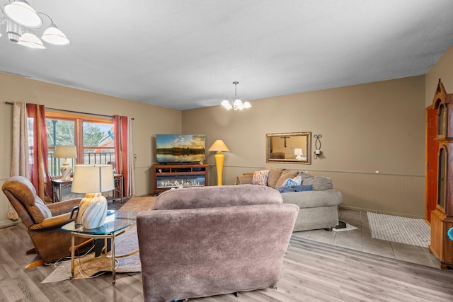 13229 Fremont Ave, Zimmerman, MN 55398 - living room with a chandelier and wood finished floors