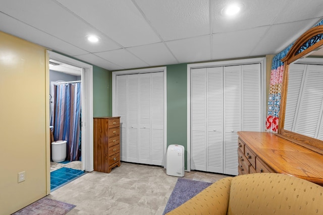 13229 Fremont Ave, Zimmerman, MN 55398 - bedroom featuring two closets, a paneled ceiling, and ensuite bath