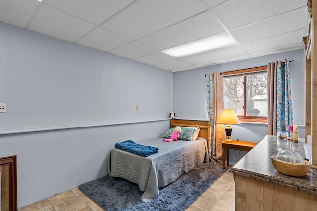 13229 Fremont Ave, Zimmerman, MN 55398 - bedroom featuring a drop ceiling and light tile patterned floors