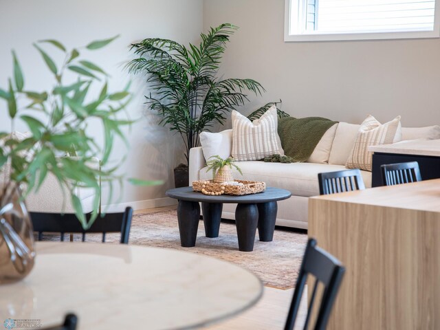 living room featuring baseboards