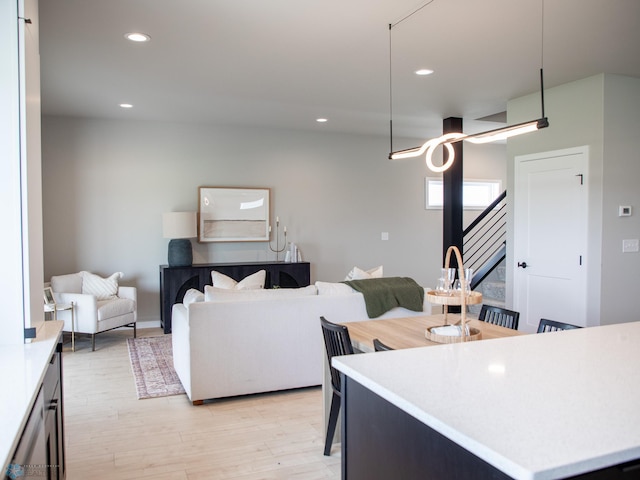 1479 66th Ave S, Fargo, ND 58104 - living room featuring light wood finished floors and recessed lighting
