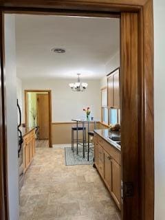hall with a chandelier