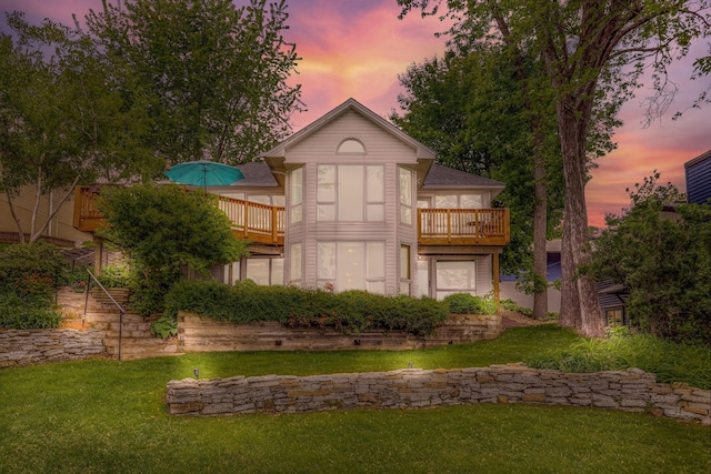3310 Lake Johanna Blvd, Arden Hills, MN 55112 - rear view of house with a balcony and a lawn