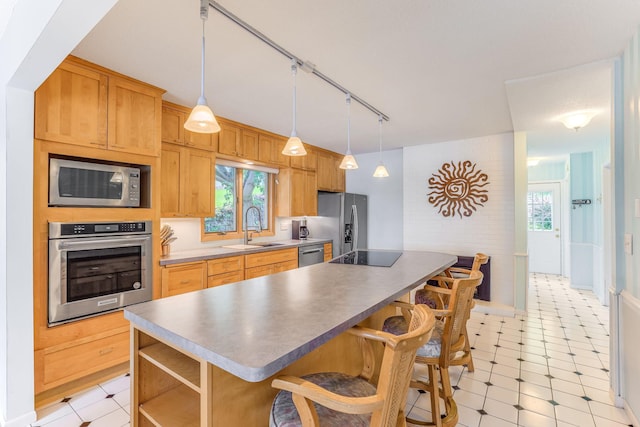 3310 Lake Johanna Blvd, Arden Hills, MN 55112 - kitchen with stainless steel appliances, a sink, a kitchen bar, a kitchen island, and open shelves