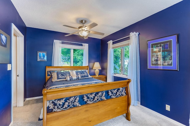 3310 Lake Johanna Blvd, Arden Hills, MN 55112 - carpeted bedroom with baseboards, ceiling fan, and a textured ceiling