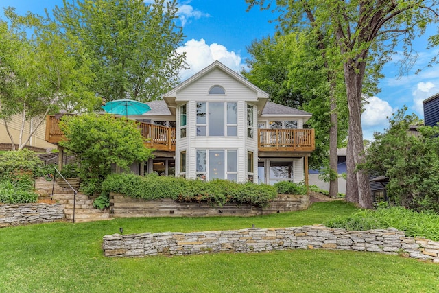 3310 Lake Johanna Blvd, Arden Hills, MN 55112 - rear view of house with a yard, a wooden deck, and a shingled roof