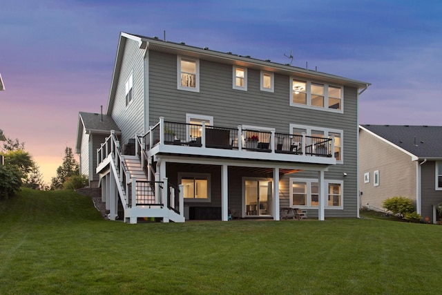 565 Juniper Ct N, Lake Elmo, MN 55042 - back of house with stairway, a lawn, and a wooden deck