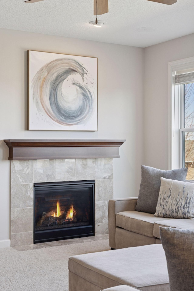 565 Juniper Ct N, Lake Elmo, MN 55042 - living room featuring a tiled fireplace and carpet