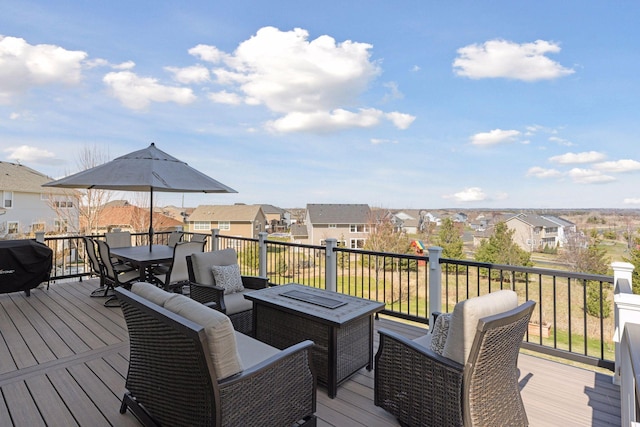 565 Juniper Ct N, Lake Elmo, MN 55042 - wooden deck featuring a residential view, outdoor dining space, and an outdoor living space