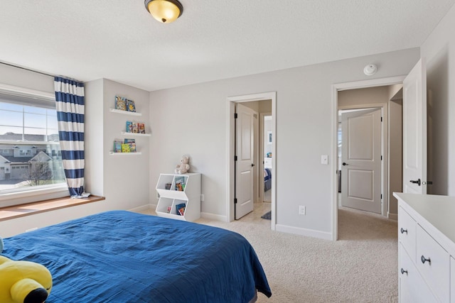 565 Juniper Ct N, Lake Elmo, MN 55042 - bedroom with light carpet, baseboards, and a textured ceiling