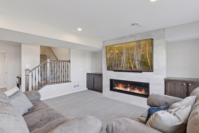 565 Juniper Ct N, Lake Elmo, MN 55042 - carpeted living room with recessed lighting, stairway, visible vents, baseboards, and a fireplace