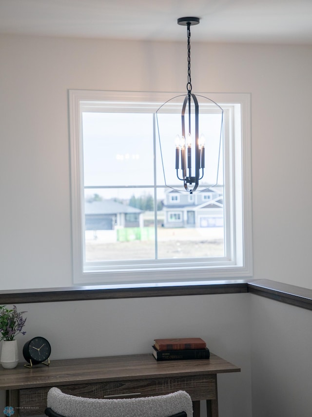 6735 Meadow View Dr S, Fargo, ND 58104 - details with a notable chandelier