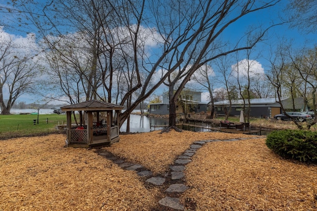 211 Peninsula Rd, Medicine Lake, MN 55441 - view of yard with a gazebo and a water view