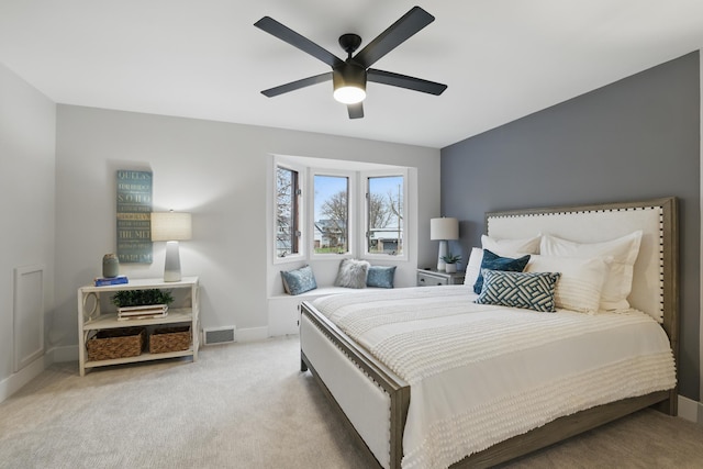 211 Peninsula Rd, Medicine Lake, MN 55441 - carpeted bedroom featuring baseboards and a ceiling fan