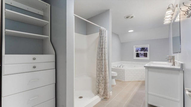 bathroom featuring lofted ceiling, tile patterned flooring, a shower stall, a garden tub, and vanity