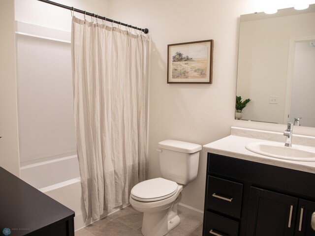 bathroom with tile patterned floors, vanity, toilet, and shower / tub combo