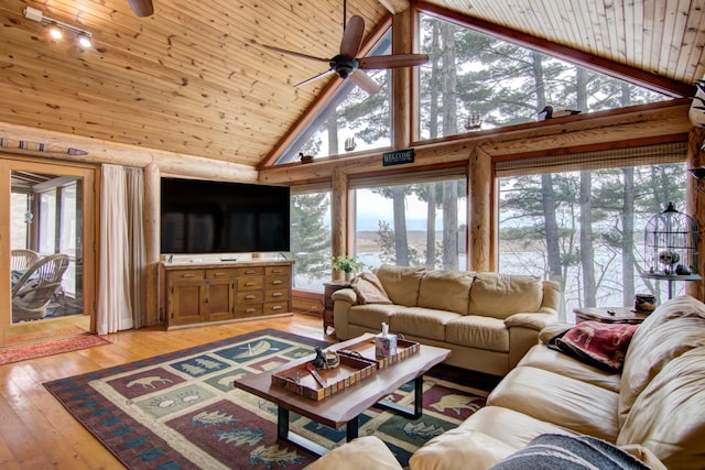 E6516 867th Ave, Colfax, WI 54730 - living room with high vaulted ceiling, a ceiling fan, plenty of natural light, light wood-style flooring, and wooden ceiling