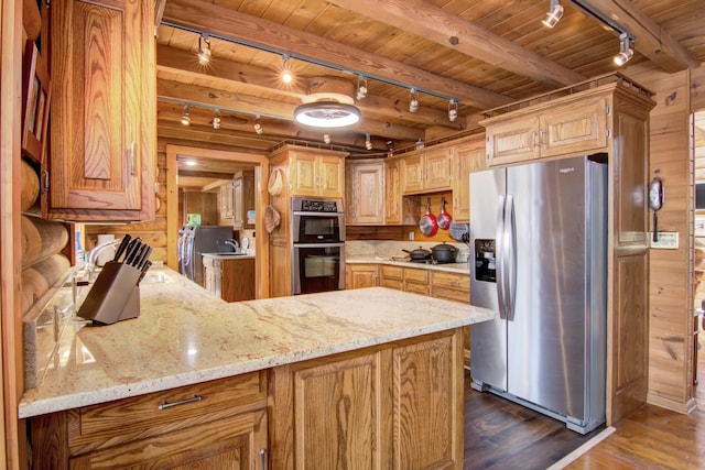 E6516 867th Ave, Colfax, WI 54730 - kitchen featuring appliances with stainless steel finishes, track lighting, wooden ceiling with exposed beams, dark wood-style floors, and a peninsula