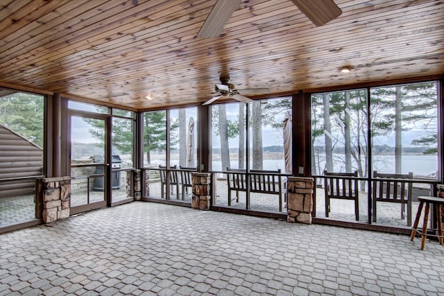 E6516 867th Ave, Colfax, WI 54730 - unfurnished sunroom featuring a water view, carpet floors, expansive windows, a ceiling fan, and wooden ceiling