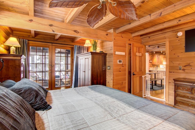 E6516 867th Ave, Colfax, WI 54730 - bedroom featuring french doors, wooden walls, and wood ceiling with exposed beams