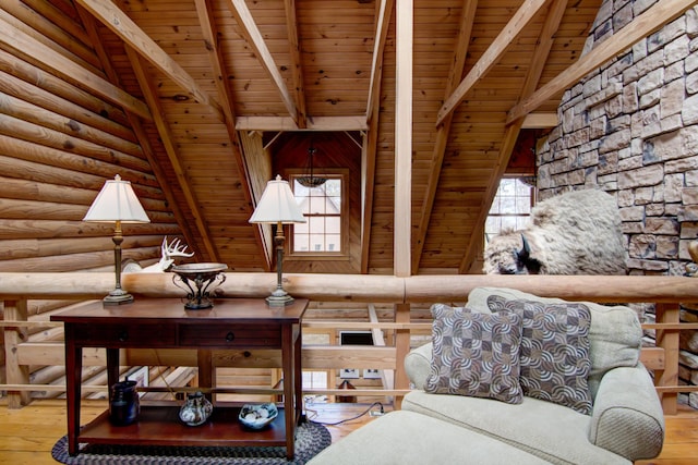 E6516 867th Ave, Colfax, WI 54730 - living area featuring wood ceiling, hardwood / wood-style flooring, and log walls