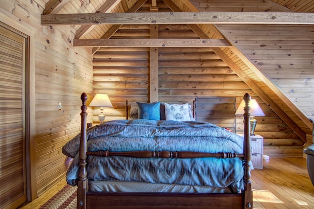 E6516 867th Ave, Colfax, WI 54730 - bedroom with rustic walls, hardwood / wood-style floors, and wooden ceiling