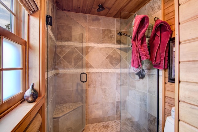 E6516 867th Ave, Colfax, WI 54730 - bathroom with a stall shower, toilet, and wood ceiling