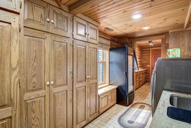 E6516 867th Ave, Colfax, WI 54730 - washroom featuring brick patterned flooring, wooden ceiling, log walls, washer / clothes dryer, and recessed lighting