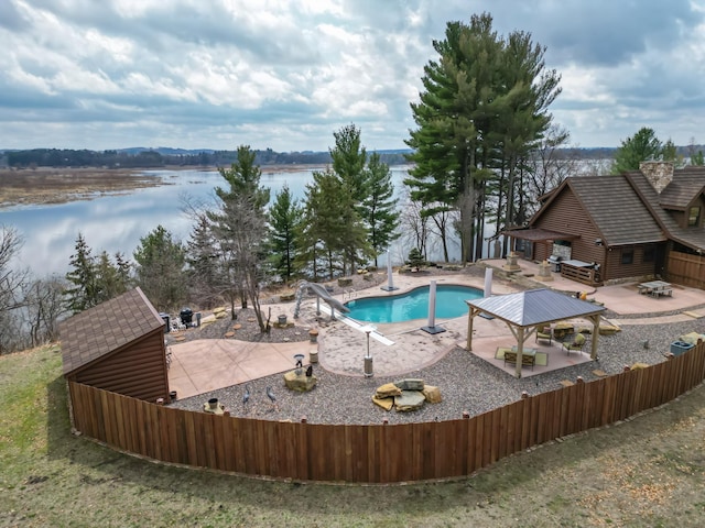 E6516 867th Ave, Colfax, WI 54730 - view of swimming pool featuring a water slide, a patio area, and a water view