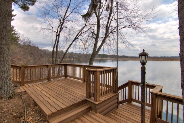E6516 867th Ave, Colfax, WI 54730 - wooden deck with a water view