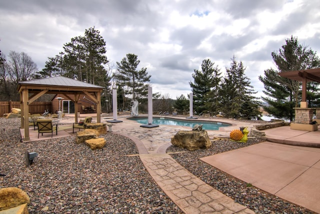 E6516 867th Ave, Colfax, WI 54730 - view of pool featuring a patio area, a gazebo, and a water slide