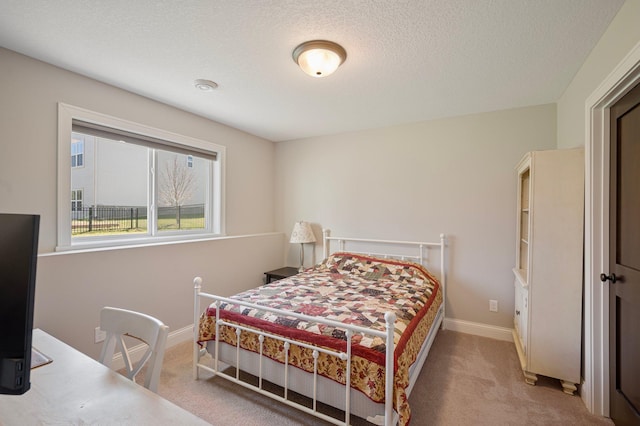12816 Cedar Ridge Ln, Champlin, MN 55316 - carpeted bedroom with baseboards and a textured ceiling