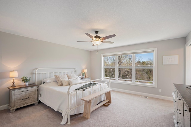 12816 Cedar Ridge Ln, Champlin, MN 55316 - bedroom with light colored carpet and ceiling fan