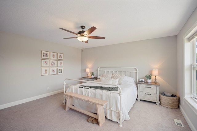 12816 Cedar Ridge Ln, Champlin, MN 55316 - bedroom with light carpet and a ceiling fan