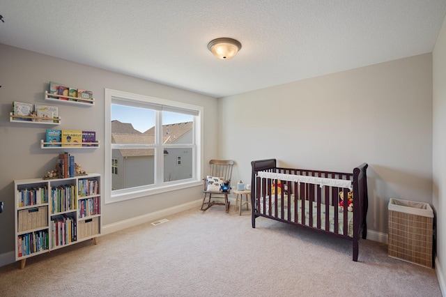 12816 Cedar Ridge Ln, Champlin, MN 55316 - bedroom featuring carpet flooring and a crib