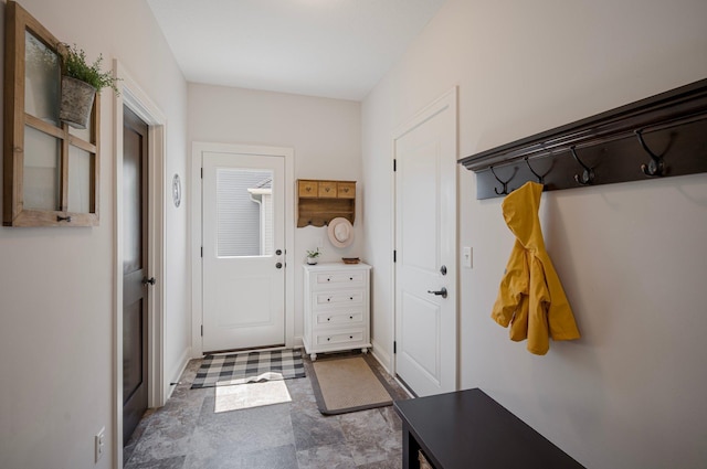 12816 Cedar Ridge Ln, Champlin, MN 55316 - mudroom featuring baseboards