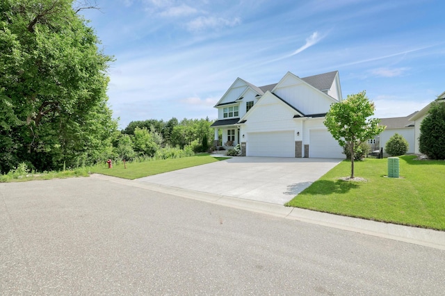 12816 Cedar Ridge Ln, Champlin, MN 55316 - view of front of property with driveway, a front lawn, a garage, and board and batten siding
