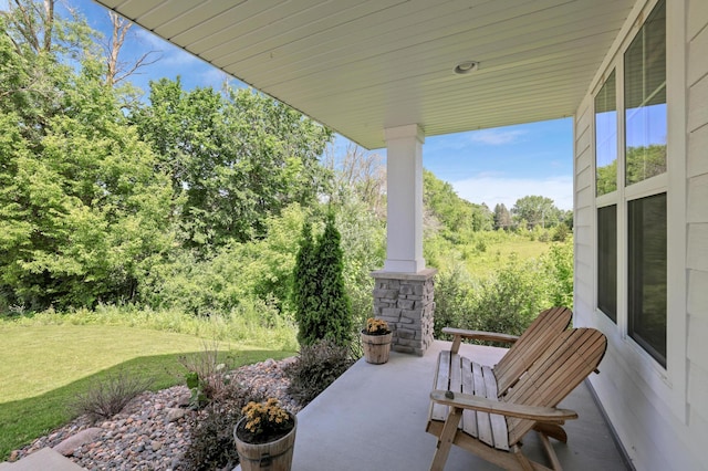 12816 Cedar Ridge Ln, Champlin, MN 55316 - covered porch featuring a yard