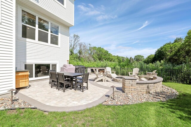 12816 Cedar Ridge Ln, Champlin, MN 55316 - view of patio / terrace with a fire pit