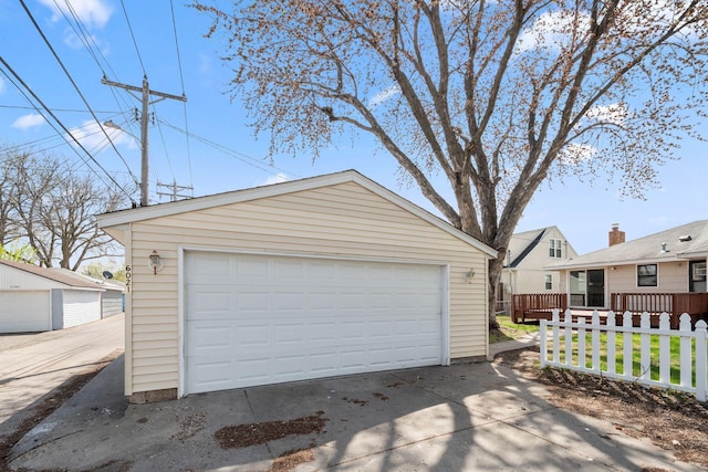 detached garage with fence