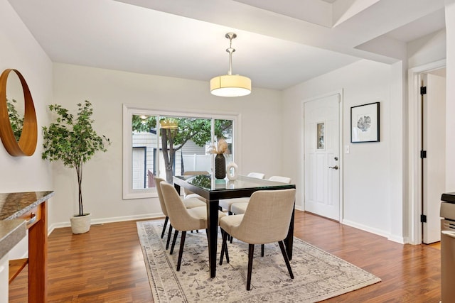 4024 Quentin Ave, Saint Louis Park, MN 55416 - dining room with dark wood-style floors and baseboards