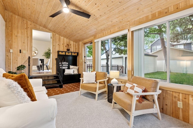 4024 Quentin Ave, Saint Louis Park, MN 55416 - carpeted living area with wood walls, plenty of natural light, vaulted ceiling, a ceiling fan, and wood ceiling